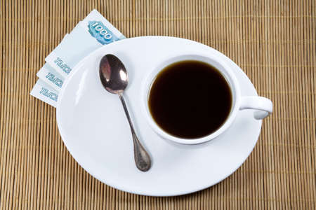 cup of coffee and moneyの写真素材