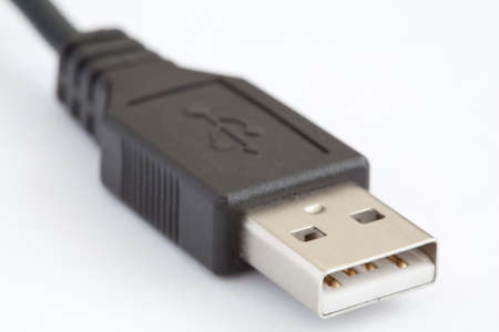 USB cable on white background  close up  Shallow depth of fieldの写真素材