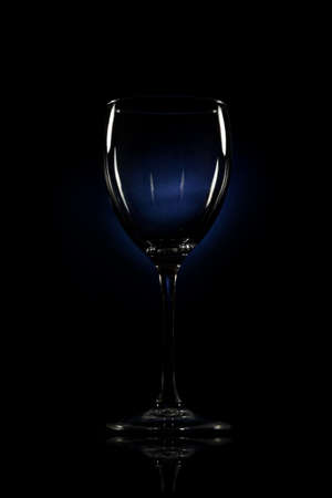 wineglass with mystic liquid on black backgroundの写真素材