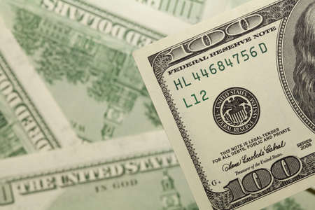 one hundred dollars backgroundの写真素材