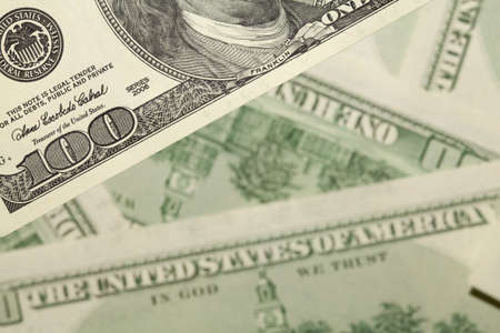 one hundred dollars backgroundの写真素材