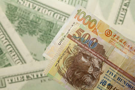 Hong kong money on dollars backgroundの写真素材