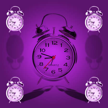 abstract view of some old alarm clocks on purple background. square composition.の写真素材