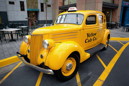 Singapore - April 19: Universal Studios Singapore.  Retro Yellow Cab on April 19, 2012, in Singapore. The Yellow Cab Company was founded in Chicago in 1914 by John D. Hertz and started business in 1915.のeditorial素材