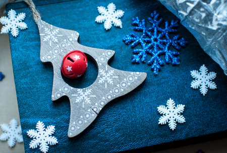 White and blue Christmas snowflakes decoration on blue and silver background. Winter wallpaper.の写真素材