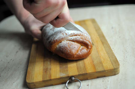 Man hands cutting pineapple pieの写真素材