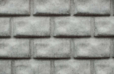 Texture of grey wall made of concrete bricksの写真素材