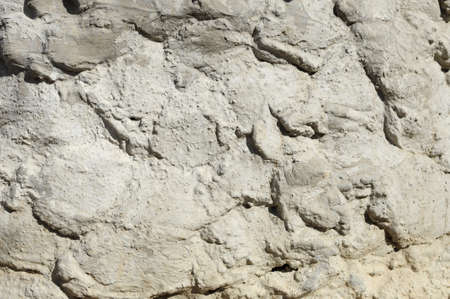 Texture of concrete wall with large strokes of plaster close-upの写真素材