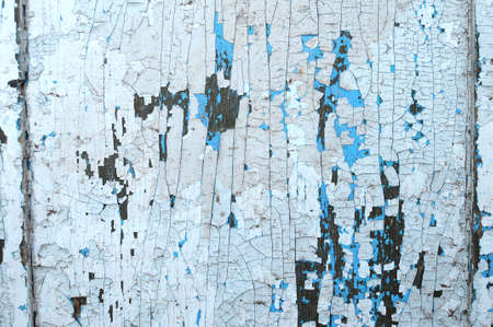 Old wooden painted light blue rustic background with peeling paint. Shabby texture or backgroundの写真素材