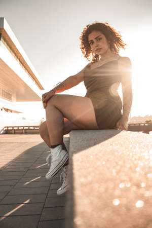 Brunette girl looking and posing.の写真素材