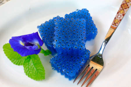 Thai sweet jelly and butterfly pea flowerの写真素材