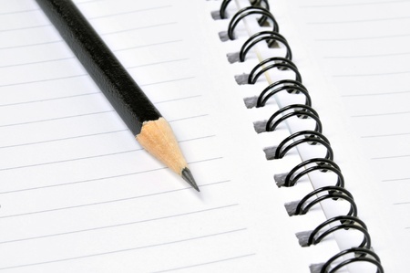 Close up of pencil on a notebookの写真素材