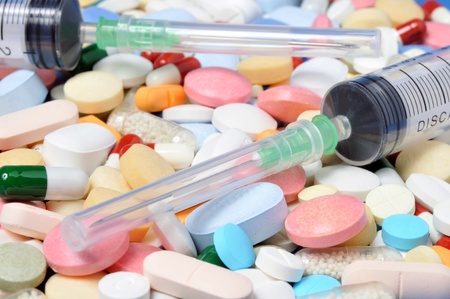 Close up of pills and syringesの写真素材