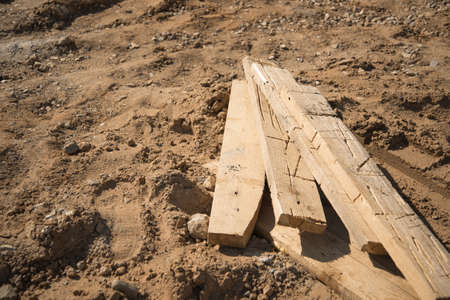 Few wooden boards lays on a groundの写真素材