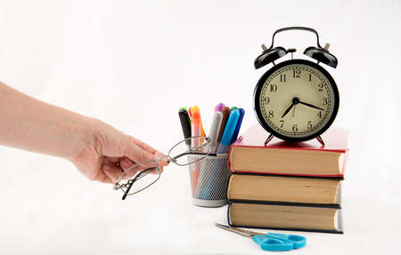 Study time preparations with glasses in women hand