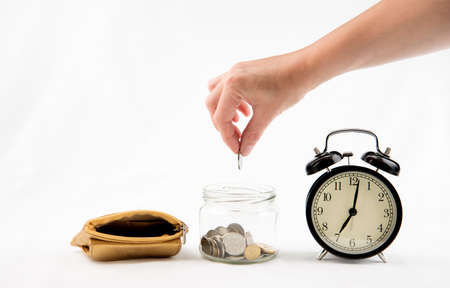 Women hand puts coin into the cupping-glassの写真素材
