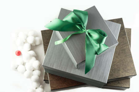 Grey and brown Presents for Christmas on White Backgroundの写真素材