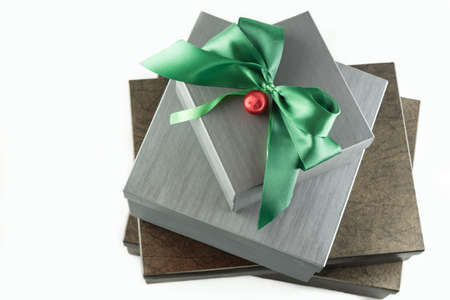 Grey and brown Presents for Christmas on White Backgroundの写真素材