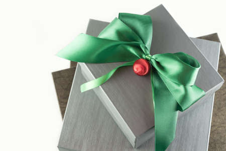 Grey and brown Presents for Christmas on White Backgroundの写真素材