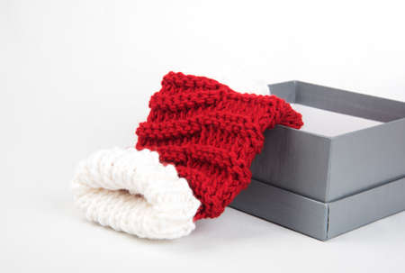 Present box with red and white xmas socks in itの写真素材
