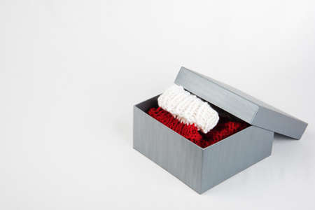 Present box with red and white xmas socks in itの写真素材