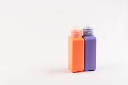 Set of small colour plastic bottles with caps on white backgroundの写真素材