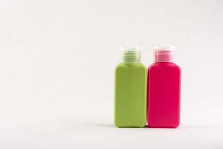 Set of small colour plastic bottles with caps on white backgroundの写真素材