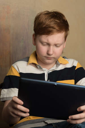 Child with a tablet pcの写真素材