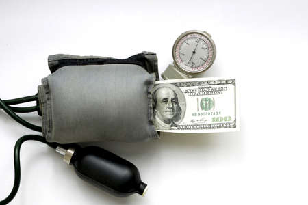 Taking pressure of one hundred dollar bill. Concept for dollar crisis. の写真素材