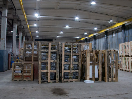Interior of warehouse with shelves and pallets for storing goodsの写真素材