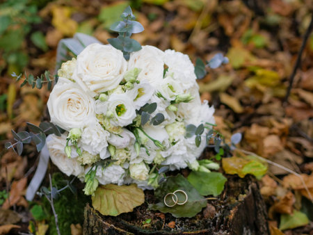 Wedding bouquet of white roses and green eucalyptusの写真素材