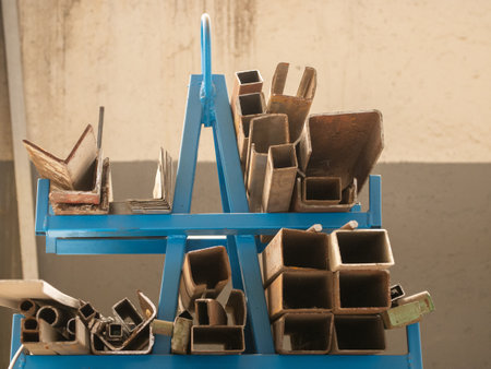 Piles of ceramic tile on blue stand in front of the wallの写真素材