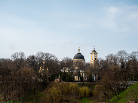 Domes of the Orthodox Cathedral among the trees of the city park