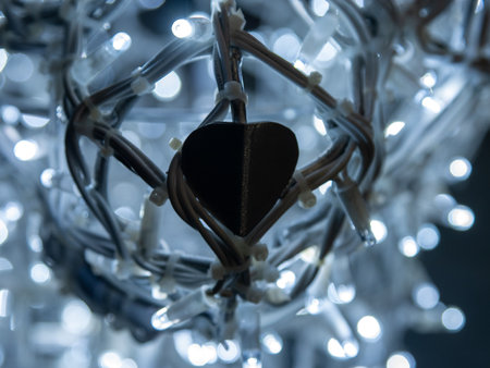 Close up of heart shaped garland with bokeh background.
