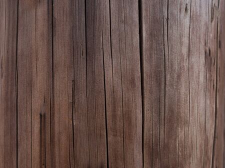 Brown scratched wooden cutting board. Wood textureの写真素材