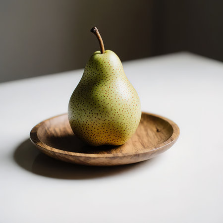 Fresh pear fruit on wooden plate with white table, Healthy fruit.Bowl with ripe pears on white background.Fresh pears in a basket on a white wooden table. Top view.created with the help of artificial intelligence.の素材