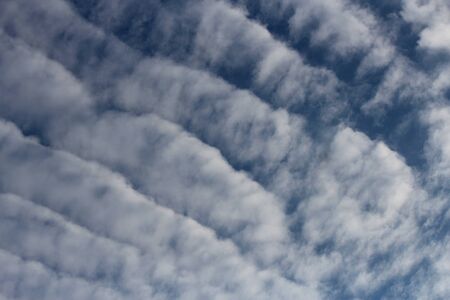 unusual picturesque clouds in the blue sky