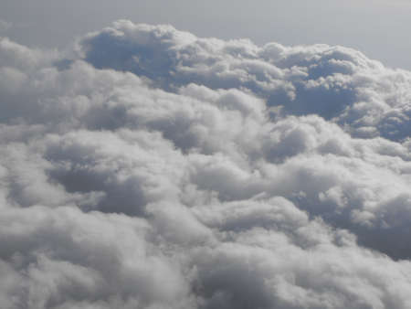 I see some clouds when I am in the airplaneの写真素材