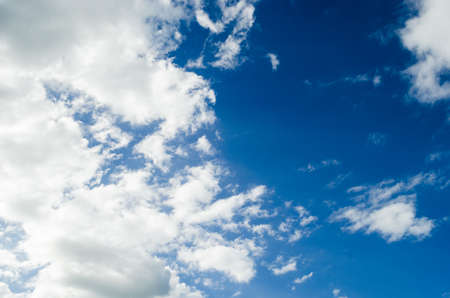 cloudy blue sky with gray clouds, nature background with blue texture and shapes of clouds, in the...