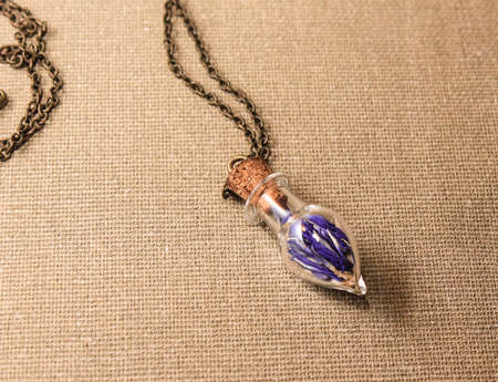 Pendant with cornflowerの写真素材