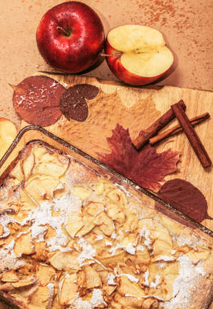 Delicious apple pie on a wooden board