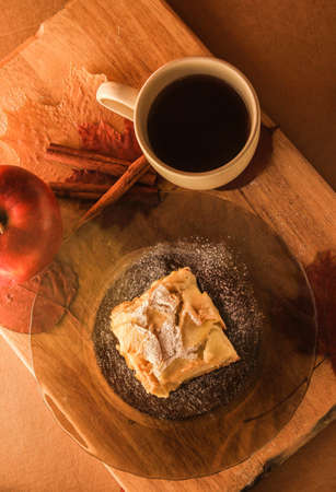 Delicious apple dessert and a cup of teaの写真素材