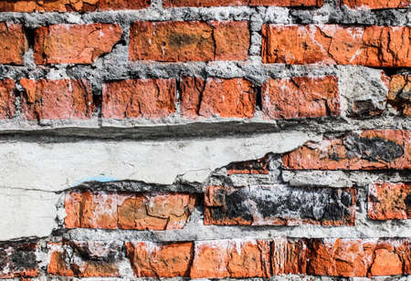 Old broken brick wallの写真素材