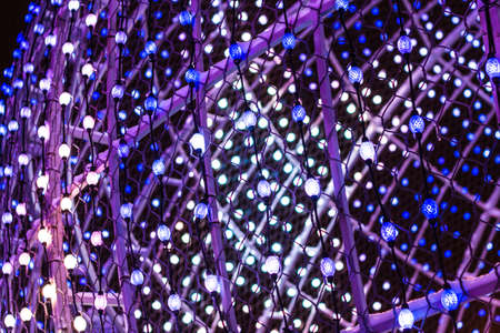 Christmas lights. Christmas background with lights. Blur Christmas lights. low depth of focus. City...