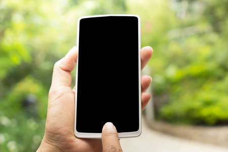 Hand of a woman  take photograph by smartphoneの写真素材