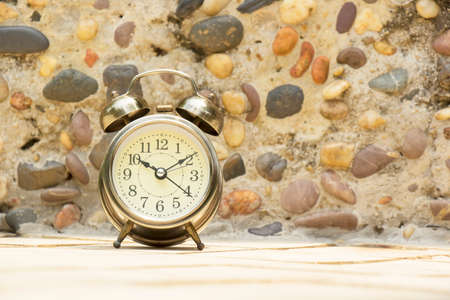 Clock on the stone background