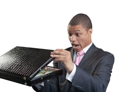 The business man opens a briefcase on a white backgroundの写真素材