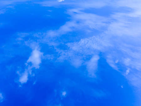 Clouds were floating across the blue sky.の写真素材