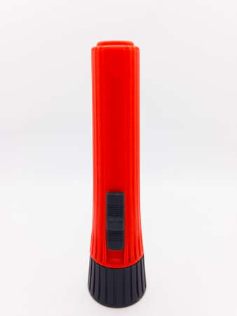 Black and red flashlight isolated on white background with clipping path.の写真素材