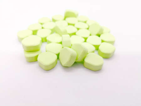 Medication and healthcare concept. Many green pentagon pills of Paracetamol (Acetaminophen) 450mg...